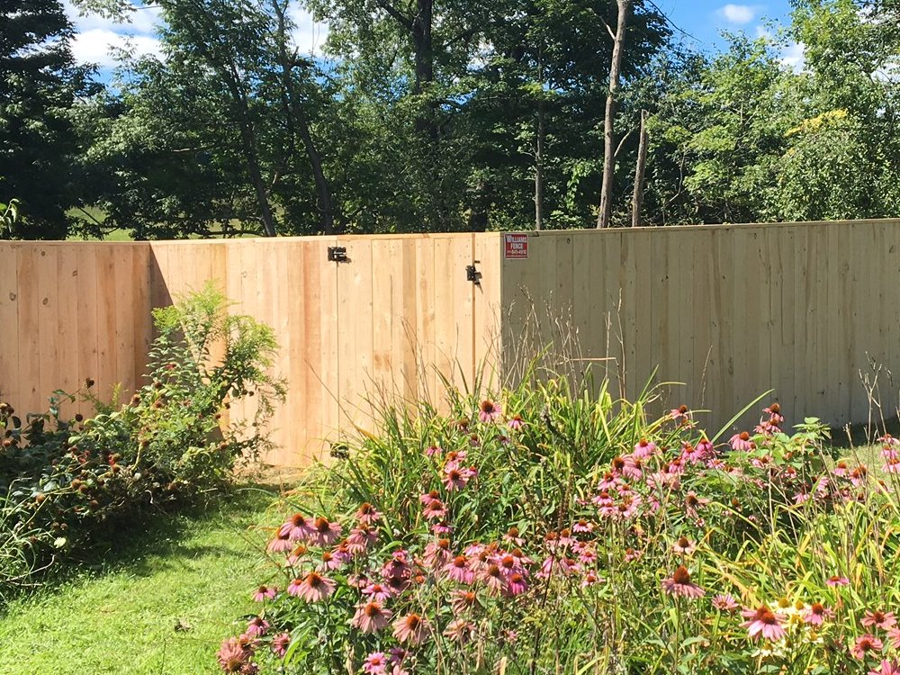 Madison NY stockade style wood fence