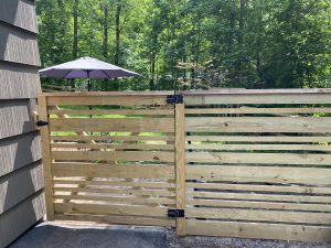 Photo of a horizontal wood fence and gate